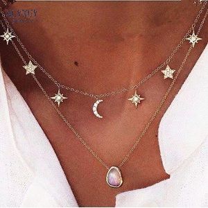 NWOT stars and moons gold plated necklace